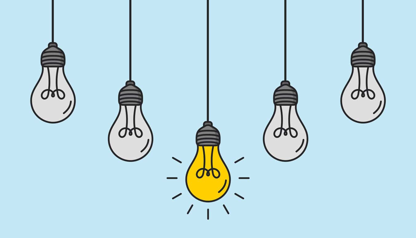 Hanging light bulbs with one glowing on white background. Concept of idea